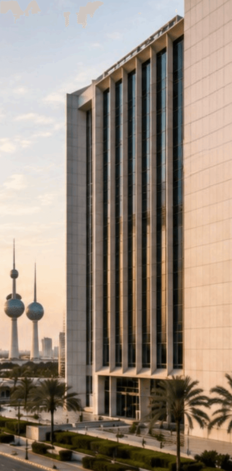 Central Bank of Kuwait building with Kuwait Towers at sunset
